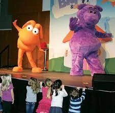 A picture of the characters at the stage performance.