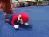 Mario down on the ground.