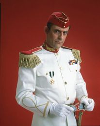 A still of Christopher Lloyd as the Dictator.
