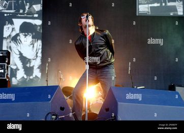 Lead-singer-of-pop-band-oasis-liam-gallagher-performing-at-finsbury-park-last-night8-july-2002-photo-andy-paradise-2F6RB7P.jpg