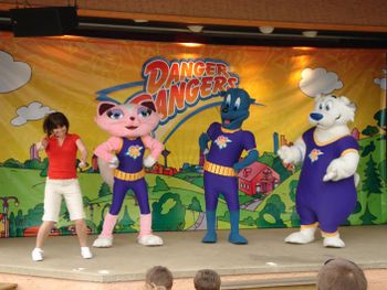 The Rangers on stage with the show's host.