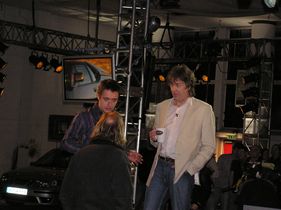Another photograph of the studio, along with presenters James May and Richard Hammond.