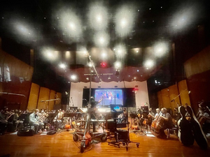 Low quality photo taken during production of the score.
