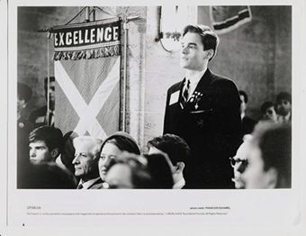 On-set photography of the "Neil's speech" scene. Text underneath credits the photographer (François Duhamel) and also reads "Permission is hereby granted to newspapers and magazines to reproduce this picture [unknown] is accompanied by [copyright information]."