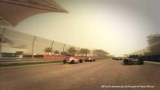 Cars zooming away at the Bahrain Grand Prix.
