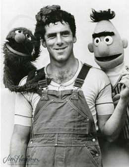 Another still showing Elliot Gould with Bert and Grover.