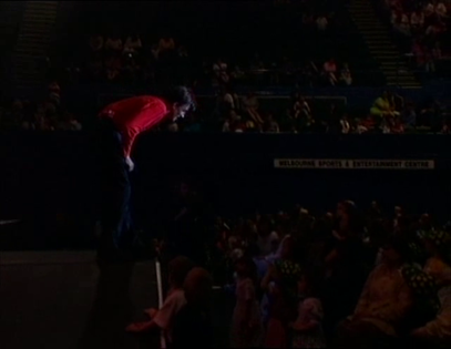 Screenshot from the Wake Up Jeff! performance with the banner revealing the location of where the concert was recorded