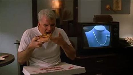 Shot of Neal eating pizza (taken from the trailer).