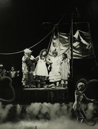 Andy, Panda, Camel, Raggedy Ann, Baby, and Marcella fly into the clouds on the boat (Broadway press photo)
