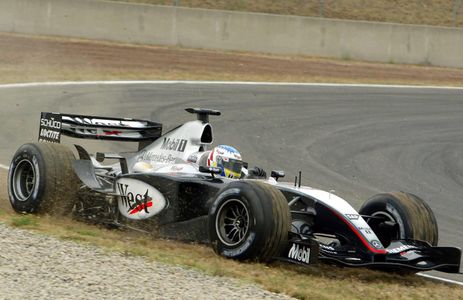 MP4-18 after ending up in the grass.