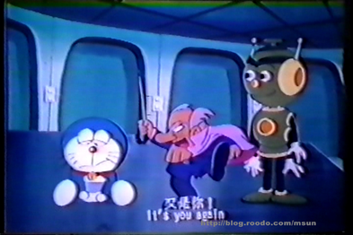 Doraemon meets a scientist and a robot.