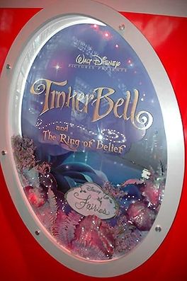 Promotional material showcasing one of the original titles, "Tinker Bell and the Ring of Belief"
