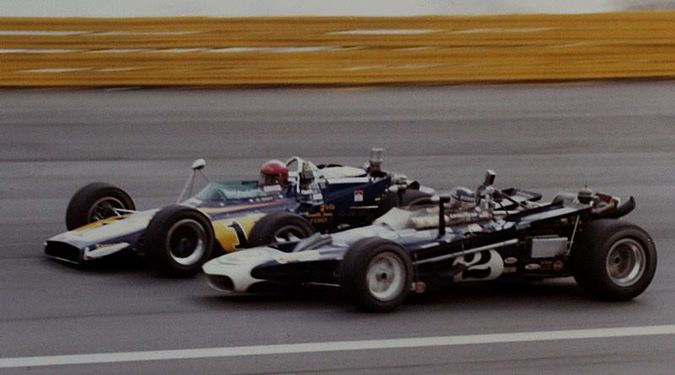 Al (1) and Bobby Unser (2) battle for the lead.