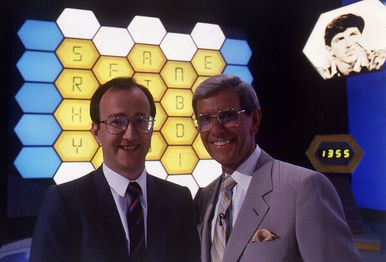A 1987 photo of Bob Holness with presumably one of the contestants.